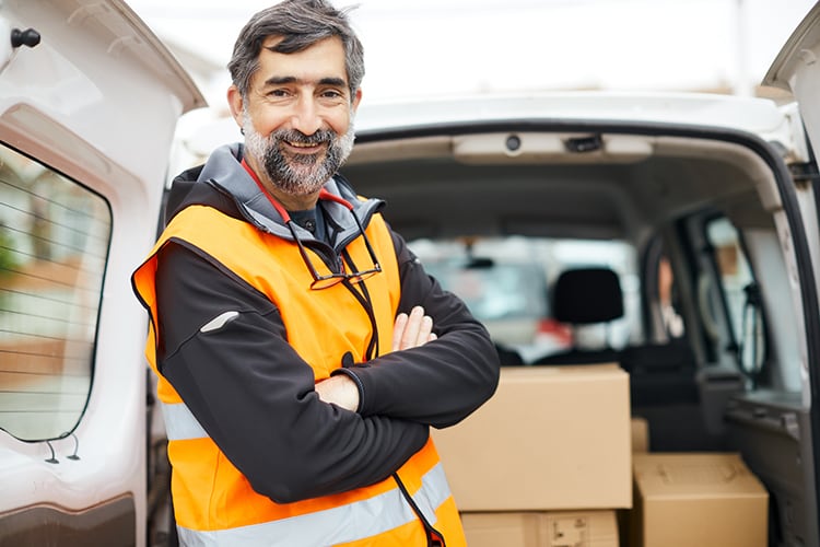 Delivery driver emptying his van
